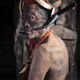 The Ang (the chief) of chen Wetnyu village with a tiger-spirit back tattoo. Only powerful people get a tiger-spirit tattoo.